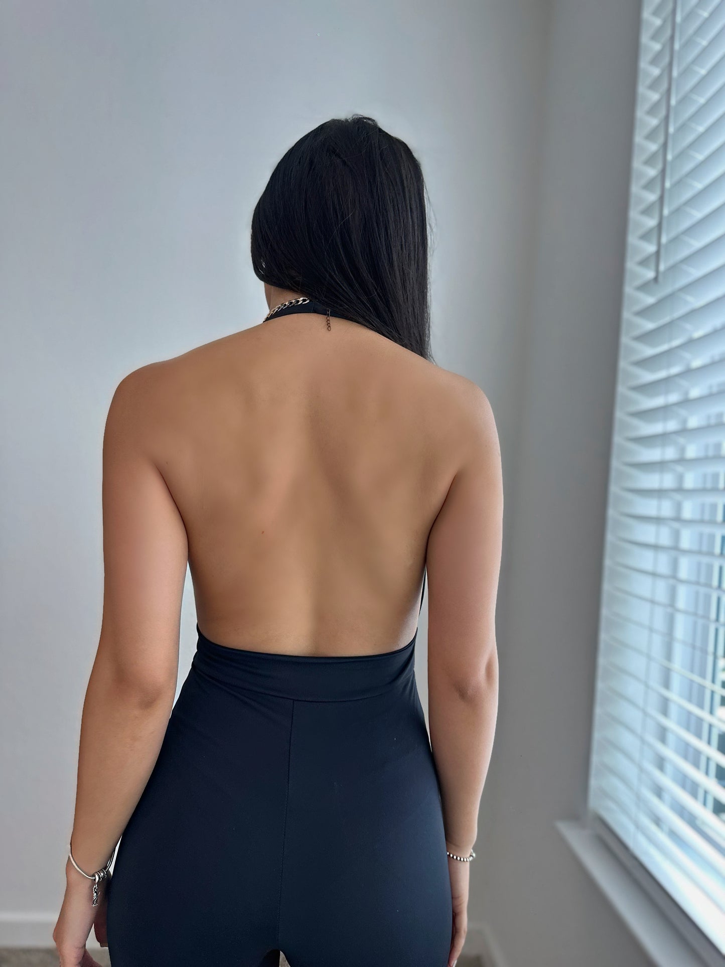 Black low-cut jumpsuit